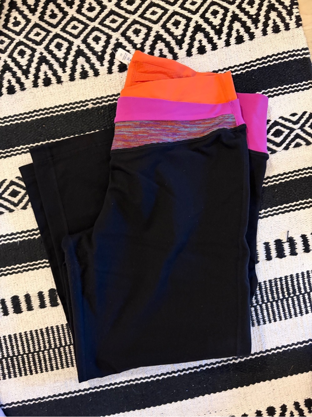 lululemon athletica Black Capri Leggings with Pink and Orange Waistband
